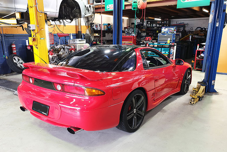 A red GTO in the workshop